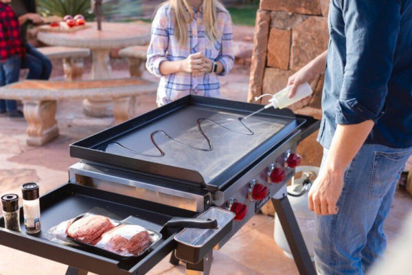 Camp Chef 4-Burner Portable Flat Top 600 Grill and Griddle Lifestyle